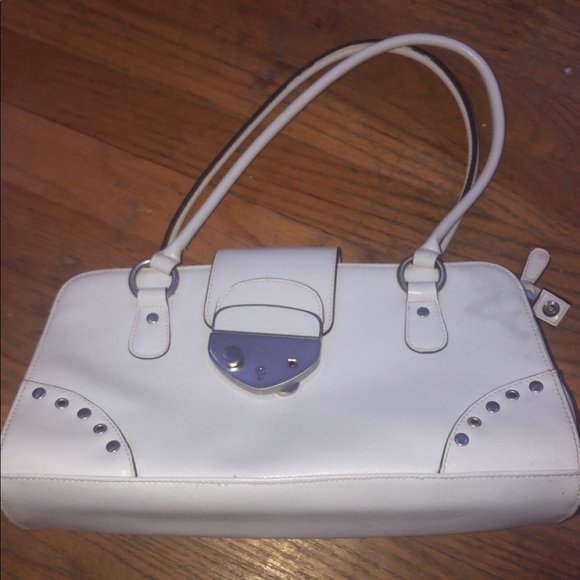 a white handbag with a brown inside - Picture 1 of 2